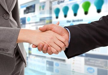 Dealer receiving recognition for outstanding LED sales performance