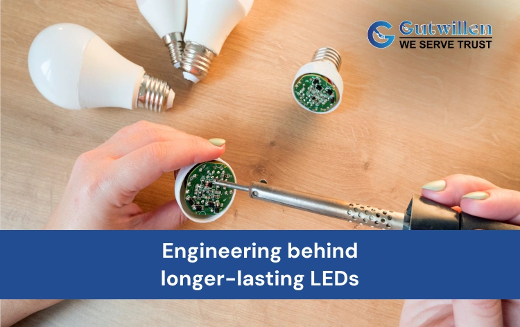 Dissected LED bulb showing internal components with an engineer working on the design