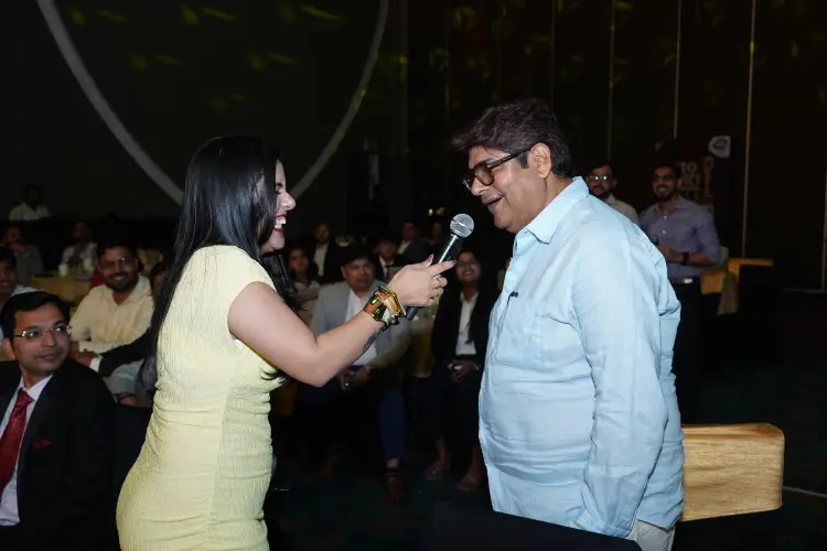 Gutwillen founder Anil Bhardwaj with RJ Apoorva on stage at BIG FM BIG Impact Awards 2026, Delhi NCR, LED lighting manufacturer in India.